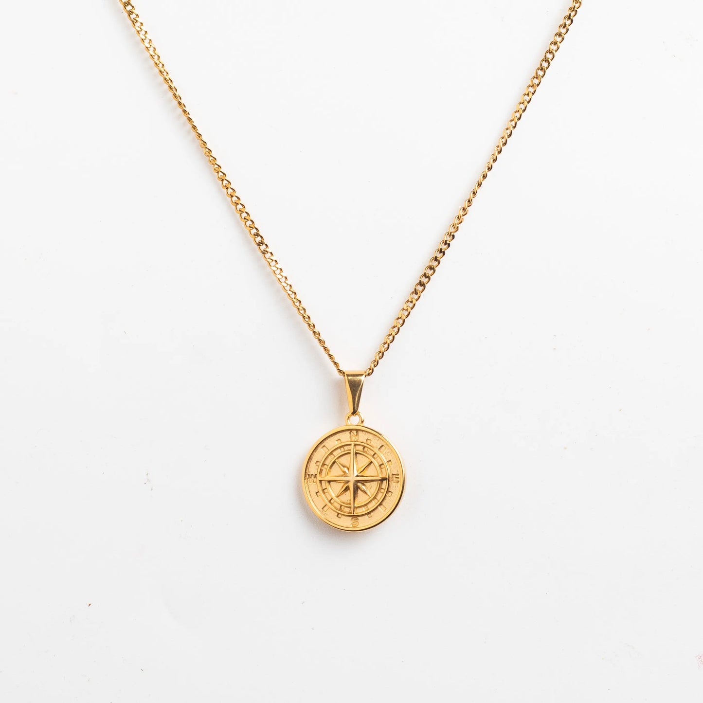 compass pendant gold