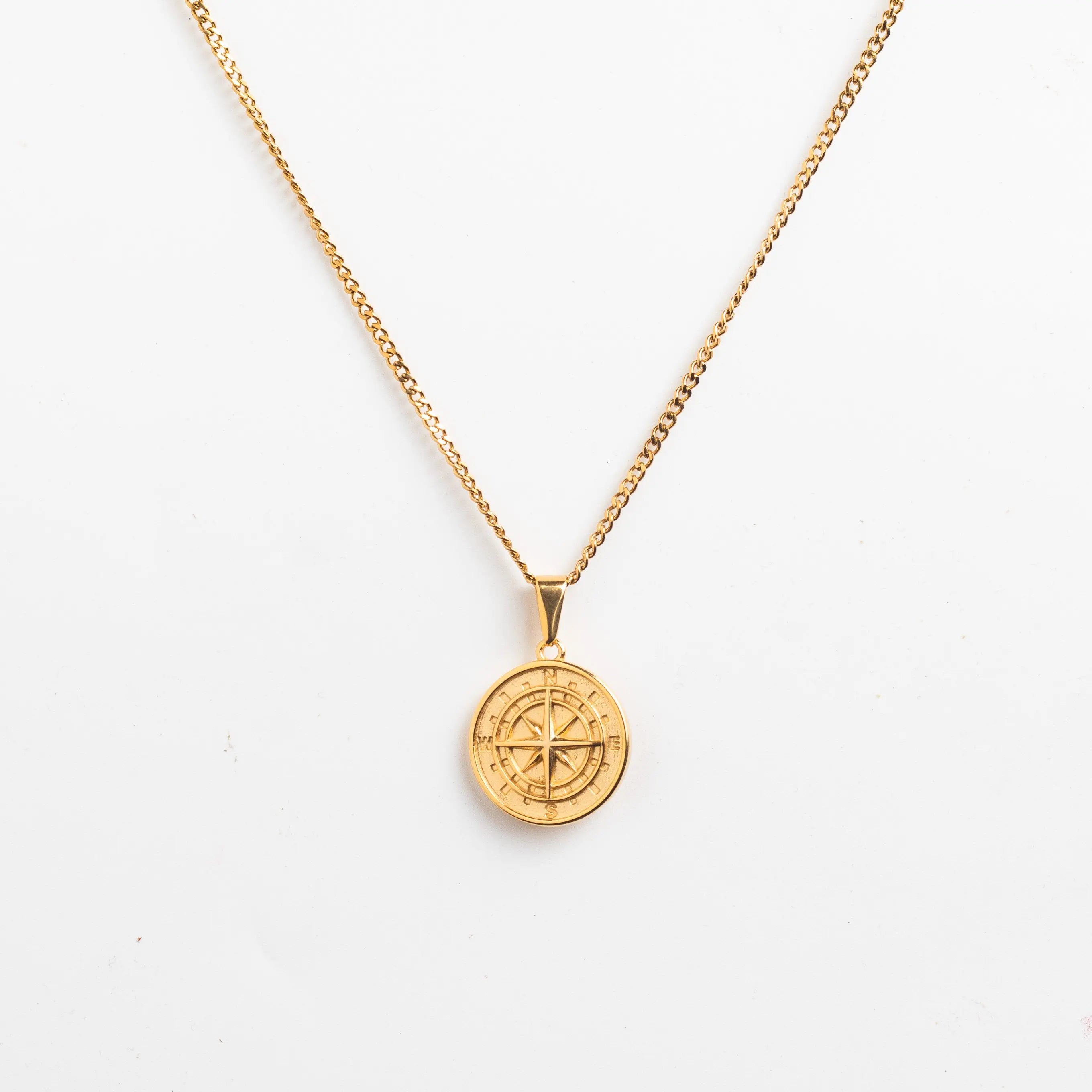 compass pendant gold